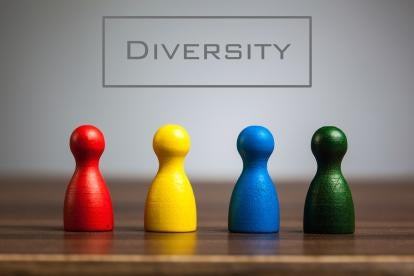 multicolored pawns representing diversity in the workplace 