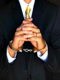 Businessman, handcuffs