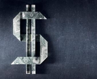 Dollar sign made from dollars