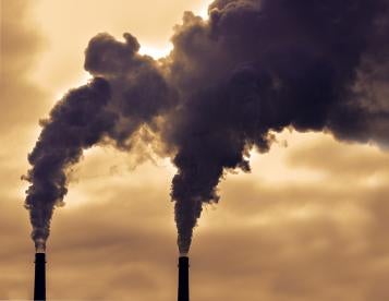 smokestacks in the UK causing huge carbon emissions and global warming