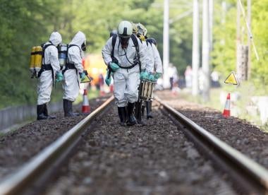 toxic substances being cleaned up from a railroad traack