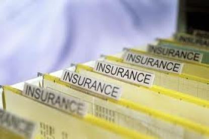yellow folder labelled insurance 