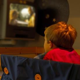 kid with tv