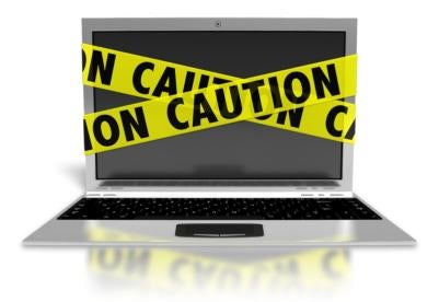laptop caution, UK, cybersecurity breach