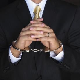 business criminal, white collar crime, businessman, handcuffs, arrest, police, trial, conviction