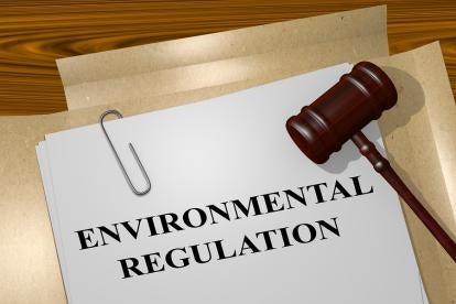Environmental Regulation Paperwork and gavel