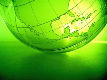 Green globe reflecting concern with climate change