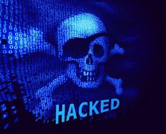 Hacked on screen with skull and crossbones 