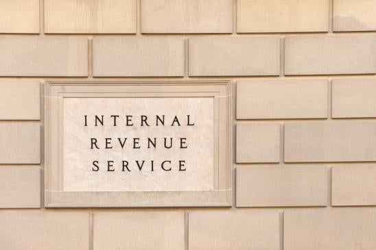 Internal Revenue Service IRS building signwhere tax laws are updated and enforced