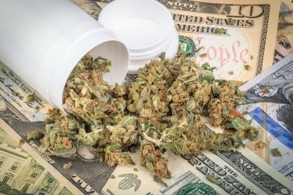 money from legalized marijuana and cannabis buds in cannisters