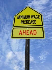 Roadsign, Minimum wage increase, For Wage and Hour Changes, Look Locally
