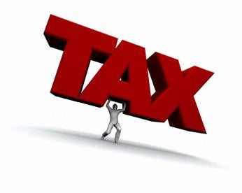 man holding up tax, Michigan business tax
