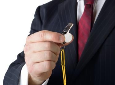 businessman holding a whistle, sec, whistleblowing