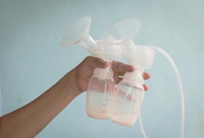 breast pump mechanism with jars to collect breastmilk expressed at place of work