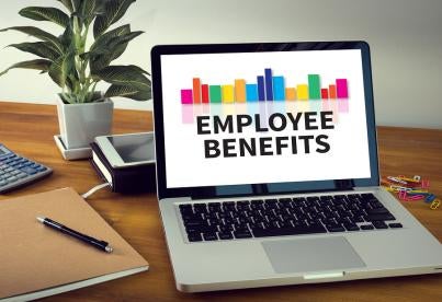 employee benefits on a laptop at work