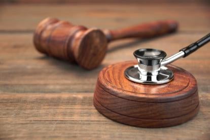Gavel stethoscope; FCA litigation, false claims act 