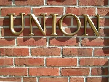 Union Law concept on a brick wall 