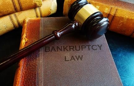 Bankruptcy law book with gavel
