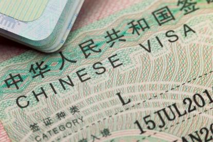 China immigration temporary reduction of visa fees