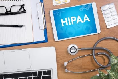 computer tablet reads HIPAA or Health Insurance Portability and Accountability Act 