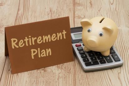 retirement plan sign with calculator