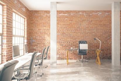 an urban office or co working space with exposed brick 