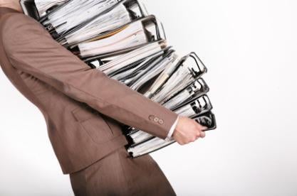 Public Company Acquired Company Financial Statement Rules: Man Carrying Binders of SEC Required Disclosures
