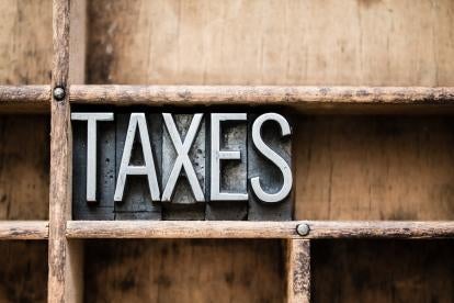 taxes in vintage letters