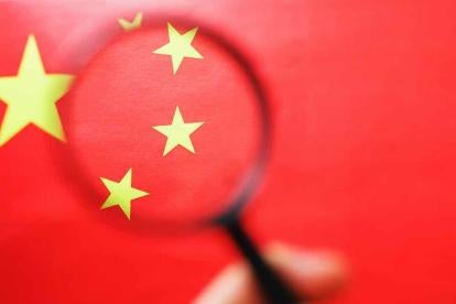 China Flag and Magnifying Glasses