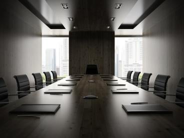 corporate boardroom where litigation matters are discussed