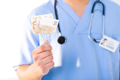 doctor with money, alternative payment