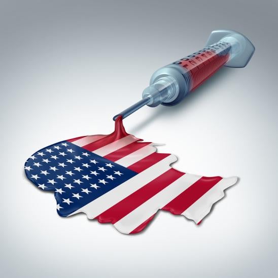 American healthcare with a syringe and an American flag in the shape of a person