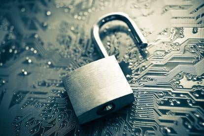 Lock on circuit board, cybersecurity, Edward Snowden