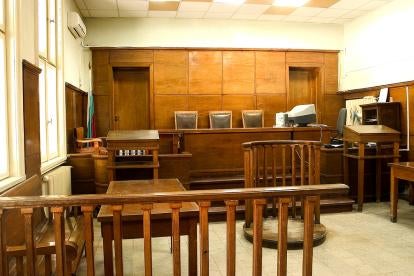 empty courtrooms like this one due to COVID have been largely replaced by virtual court proceedings