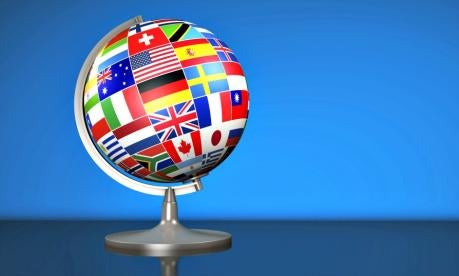 a desktop globe with flags of nations