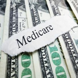 medicare on a stack of US currency