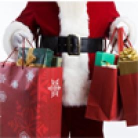 Santa Claus Holding Shopping Bags