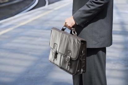 Employee with briefcase, background check, California
