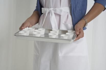 nurse with pill containers
