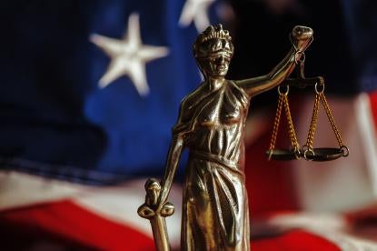 lady justice with the scales of justice and the blindfold of justice