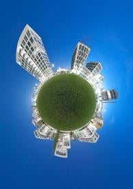 city condos high rise developments arranged around a green globe
