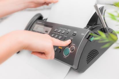 fax machine in a office and at the center of a tcpa lawsuit