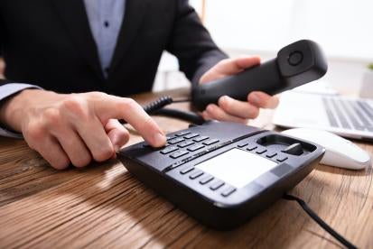dialing by hand is AOK with all circuit courts as far as TCPA is concerned