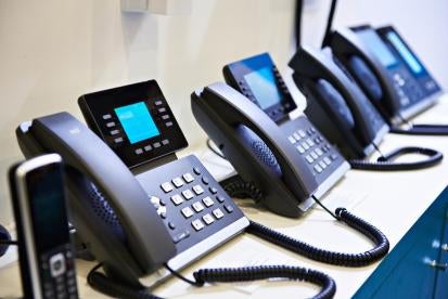 telephones used to call 911 over VOIP system or landline