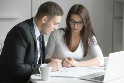 man and woman at work, harassment