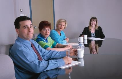 people at a table, delaware, compliance review