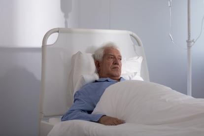 unhappy elderly man in nursing home