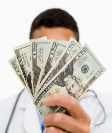 doctor with cash, cms, payment, stark law
