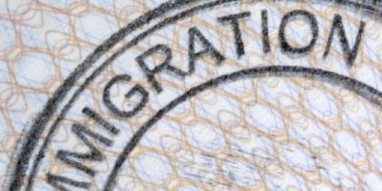 immigration stamp on papers for immigrants from countries receiving a TPS extension