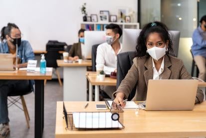 Employees who have been vaccinated may have to wear masks regardless of their vaccination status